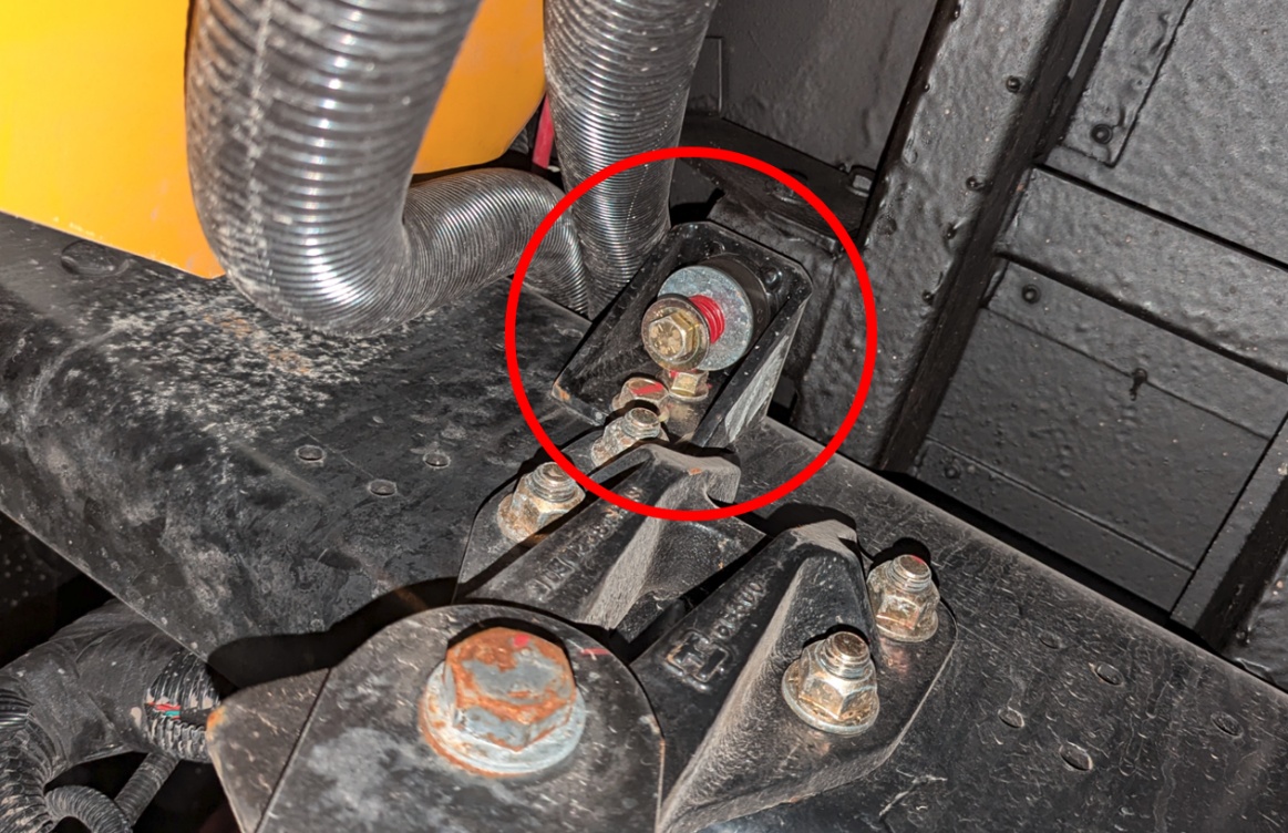 Figure 4- Front body mount with tension spring.