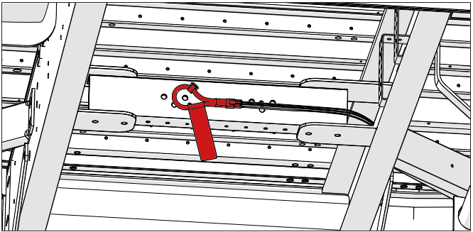 Figure 1 – Boucle de déconnexion d’urgence fixée à la dernière traverse du châssis.